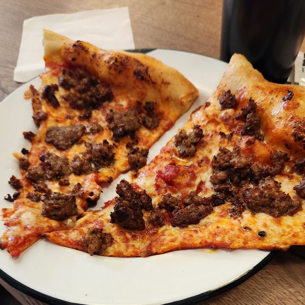 Cowboy Pizza - Sausage slices - Pizza Near Me - Cave Creek, Arizona Cowboy Pizza - Sausage slices - Pizza Near Me - Cave Creek, Arizona
