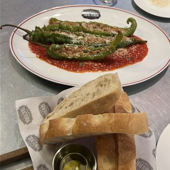 Guy Fieri's Trattoria - Long Hots with bread, Parmesan and cheese - Italian Near Me - Columbus, Ohio Guy Fieri's Trattoria - Long Hots with bread, Parmesan and cheese - Italian Near Me - Columbus, Ohio