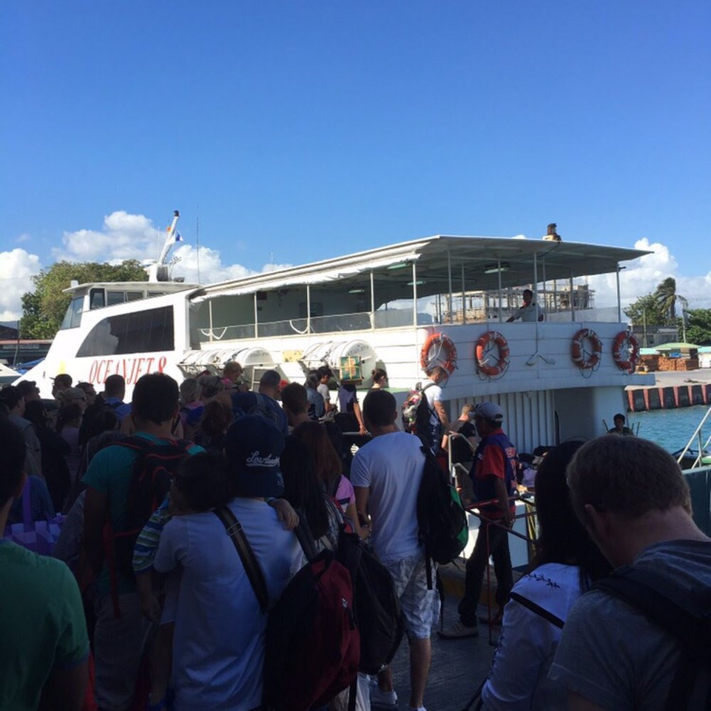 Supercat Fast Ferry - Line boarding the ferry - Travel Services Near Me - Cebu City, CEB Supercat Fast Ferry - Line boarding the ferry - Travel Services Near Me - Cebu City, CEB