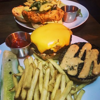Pharmacie Bar + Kitchen - Burger & fries, with a chicken sandwich trying to photobomb. - Venues & Event Spaces Near Me - Montclair, New Jersey