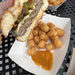 Channel Inn - RU Nuts Burger and tots with a house mustard/bbq sauce