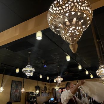 Namaste Baltimore - a bride and groom dancing in a restaurant - Indian Near Me - Baltimore, Maryland