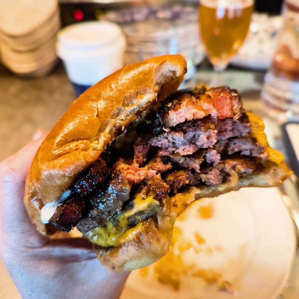 Au Cheval - Double cheeseburger burger with peppered bacon is actually 3 burger patties.. - Bars Near Me - Chicago, Illinois Au Cheval - Double cheeseburger burger with peppered bacon is actually 3 burger patties.. - Bars Near Me - Chicago, Illinois