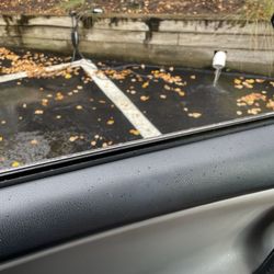 Community Focus of NC - EV charging cord laying in a pool of water in front of my unit.