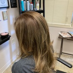 Hair by Maria - Medium brown color , caramel hilites. Layers cut and blow dry