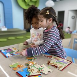 Bloom - Our learning centers encourage collaboration and turn-taking.