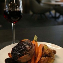 Bistro On 4th - Prosciutto wrapped beef tenderloin