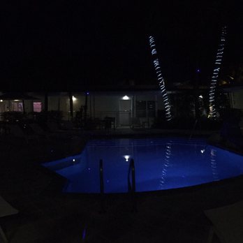 Orchid Key Inn - Night time view of the courtyard/pool - Hotels Near Me - Key West, Florida Orchid Key Inn - Night time view of the courtyard/pool - Hotels Near Me - Key West, Florida