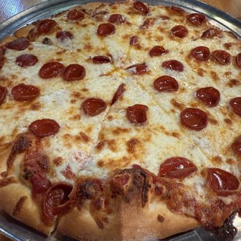 Miami's Best Pizza - Pepperoni pizza with extra cheese - Pizza Near Me - Coral Gables, Florida