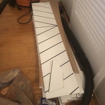 JOContractors - a box of cardboard and a vacuum - Flooring Near Me JOContractors - a box of cardboard and a vacuum - Flooring Near Me