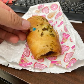 Mia’s Donuts - Blue plastic in the breading and what looks like two day-old sausage. - Donuts Near Me - Rowlett, Texas
