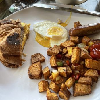 Caddy's Restaurant - 1/2 of a breakfast sandwich and single egg and sausage with country potatoes - Breakfast & Brunch Near Me - Ione, California
