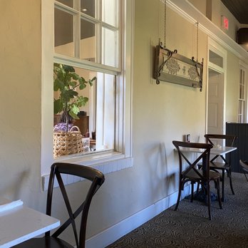 House - tables and chairs in front of a window - Bars Near Me - Emmaus, Pennsylvania