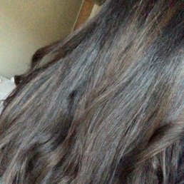 Subtle dark brown balayage in very black hair