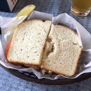 Chuck's Tavern - Tuna salad sandwich on white, comes with a pickle! - Burgers Near Me - Fontana, Wisconsin Chuck's Tavern - Tuna salad sandwich on white, comes with a pickle! - Burgers Near Me - Fontana, Wisconsin