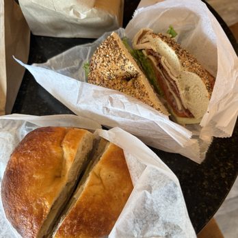 Uncommon Grounds - Sausage egg cheese on cheddar parm bagel and the flying pig on everything bagel - Coffee & Tea Near Me - Clifton Park, New York Uncommon Grounds - Sausage egg cheese on cheddar parm bagel and the flying pig on everything bagel - Coffee & Tea Near Me - Clifton Park, New York