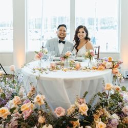 The Lighthouse - Our sweetheart table backdrop was the gorgeous marina and large windows!
