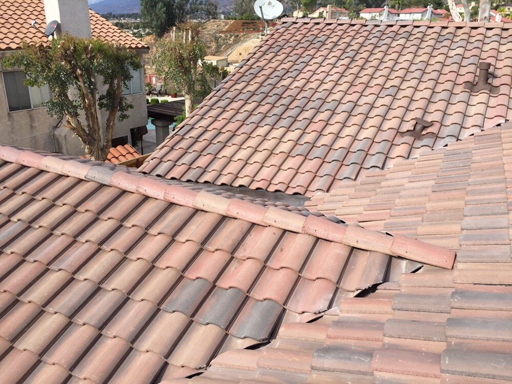 Slide of H&M ROOFING