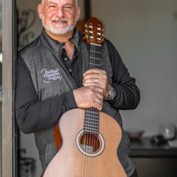 Savage Classical Guitar - My photographer, Leslie, made me pose.  She's a nice lady, so I agreed.  LOL