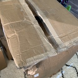 FedEx Ship Center - Box opened?! No big deal, just an $8,000 car seat for a child with special needs!