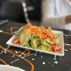 Mr. Q Restaurant - Entree comes with choice of soup or salad.