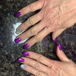 Whole hands with hologram ring finger & purple chrome nails Whole hands with hologram ring finger & purple chrome nails