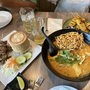 Siam Station - Chicken satay  Pork skewers with sticky rice Zesty Khao soi - Thai Near Me - Irvine, California