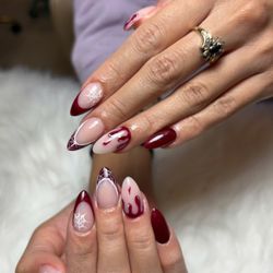 Trendy Nails Spa - Burgundy French nails with seasonal Halloween-inspired details at Trendy Nails Spa in San Marcos.