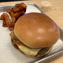 The smokehouse burger with sweet potato fries and Sriracha aioli at HipCityVeg. The smokehouse burger with sweet potato fries and Sriracha aioli at HipCityVeg.