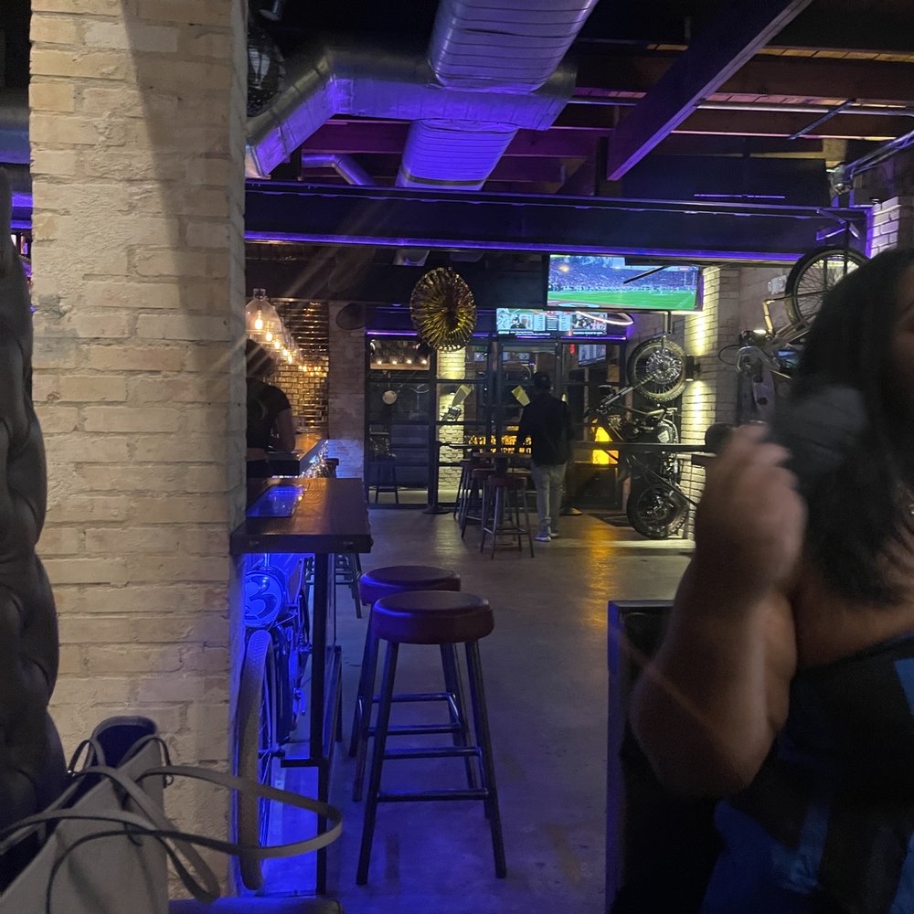 The Savoy  -  man and a woman in a bar - Hookah Bars Near Me - Houston, Texas