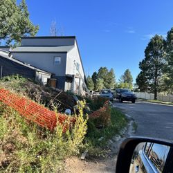 Pagosa Lodge - Disrepair. Pool unfinished piles and weeds abound