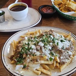 El Charro Mexican Bar & Grill - Ground beef cheese fries, $6.99 I believe.