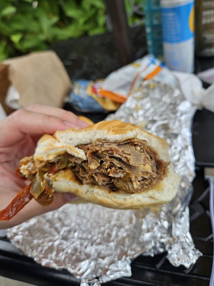 Art & Nancy's Sub & Pizza Shop Logo