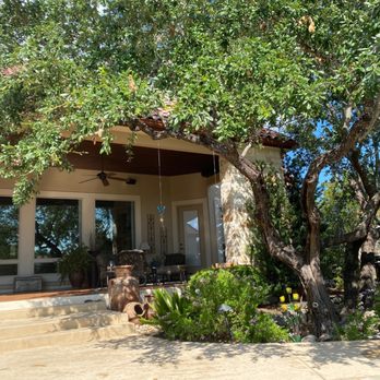 JCF Painting - the front of a house with a tree in the front yard - Painters Near Me - Boerne, Texas JCF Painting - the front of a house with a tree in the front yard - Painters Near Me - Boerne, Texas