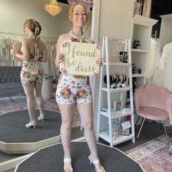 Evanna's Bridal Boutique - Photo in boutique w/ "I found the dress" sign