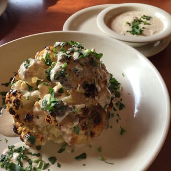 Stonefire Grill - Whole roasted cauliflower with lemon tahini sauce (love this!!) 5.99 - American Near Me - Irvine, California Stonefire Grill - Whole roasted cauliflower with lemon tahini sauce (love this!!) 5.99 - American Near Me - Irvine, California