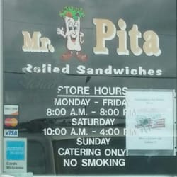 Mr Pita - Hours on door