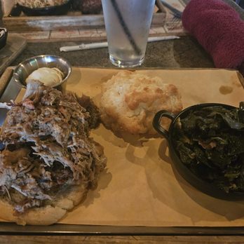 Virgil's Real BBQ - Pulled pork sandwich - it's served on a biscuit and greens - Barbeque Near Me - New York, New York Virgil's Real BBQ - Pulled pork sandwich - it's served on a biscuit and greens - Barbeque Near Me - New York, New York