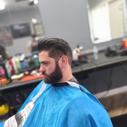 Windy City Barber Parlor - Fade and Beard work by Orlian. Call ahead or book through the Booksy app!