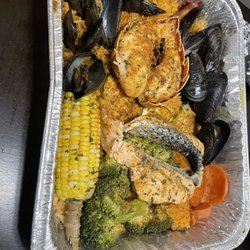 Bucas's Seafood and More - Lobster tail mussels and shrimps