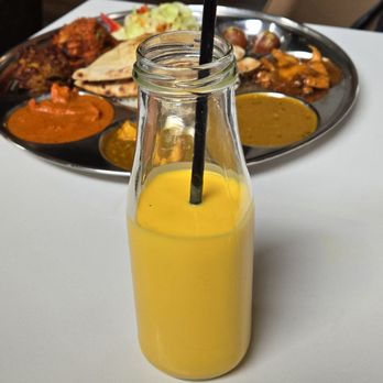 Jashan - Mango Lassi. A yogurt based non alcoholic beverage. It has the consistency of a smoothie. My wife like it. They had 3 different flavors - Indian Near Me - Nashville, Tennessee