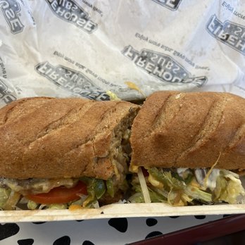 Firehouse Subs - a close up of a sandwich in a styrofoam container - Sandwiches Near Me - Mesquite, Texas