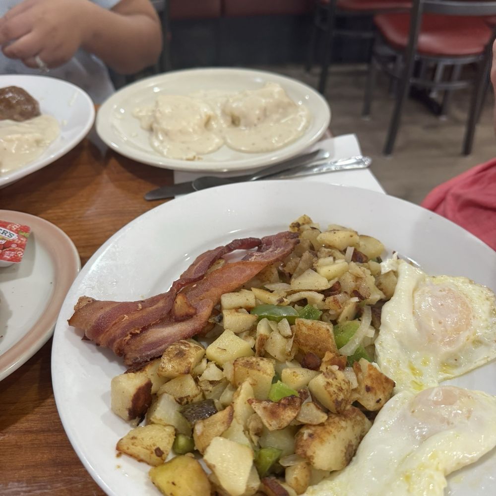 Pancake Palace - Two eggs over medium, country potatoes, bacon, and biscuits & gravy - Breakfast & Brunch Near Me - North Highlands, California Pancake Palace - Two eggs over medium, country potatoes, bacon, and biscuits & gravy - Breakfast & Brunch Near Me - North Highlands, California