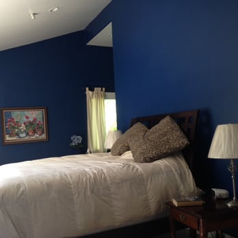 Miann Builders - Miann Builders does wonderful paint work, check out this comfortable, bright bedroom. - General Contractors Near Me