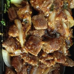 Hoanh Long Vietnamese & Chinese Restaurant - Bo Luc lac. Cubed beef that is pan seared and tossed with vegetables and marinade. Ample sauce included.
