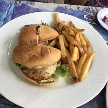 Jimmy Buffets Margaritaville Restaurant - Blackened Chicken Sandwich - New American Near Me - St. Thomas, Virgin Islands Jimmy Buffets Margaritaville Restaurant - Blackened Chicken Sandwich - New American Near Me - St. Thomas, Virgin Islands