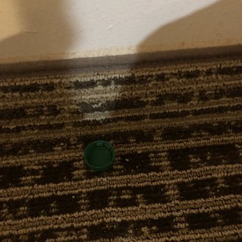 Quality Inn - Bottle cap on floor. - Hotels Near Me - Rome, Georgia