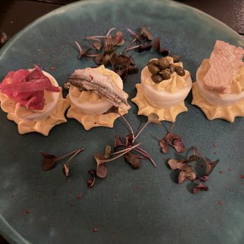 Julia's Local - Deviled egg flight: picked onion, white anchovies, capers, smoked salmon. - Scandinavian Near Me - Round Top, New York