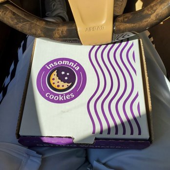 Insomnia Cookies - a box of cookies in a car - Food Delivery Services Near Me - Atlanta, Georgia Insomnia Cookies - a box of cookies in a car - Food Delivery Services Near Me - Atlanta, Georgia