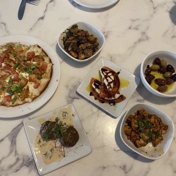 Pita Jungle - Chipotle Chicken Lavash Pizza, Garlic Mushrooms, Mozzarella Tomato & Basil, olives, Grilled Chicken with Pine Nuts, Falafel - Mediterranean Near Me - Phoenix, Arizona